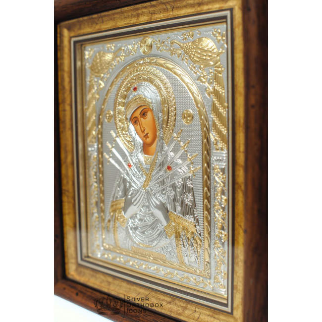 Ікона срібна Божої Матері Семистрільна 28,5х30,5 см прямокутної форми під склом